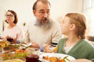 arizona grandparent rights - granddaughter eating Christmas meal with grandparents